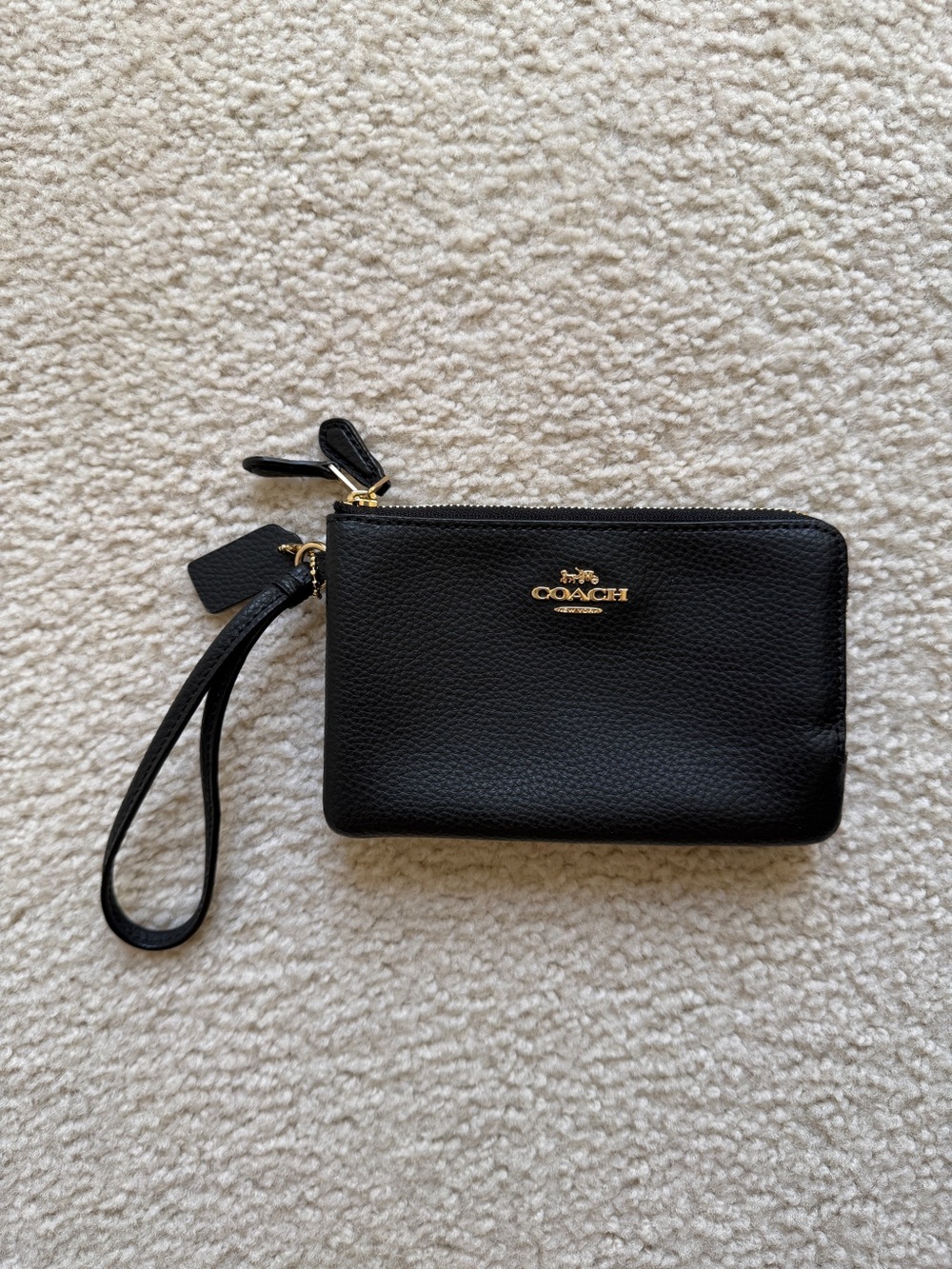 Coach Black Pebbled Leather Pouch with Gold Emblem